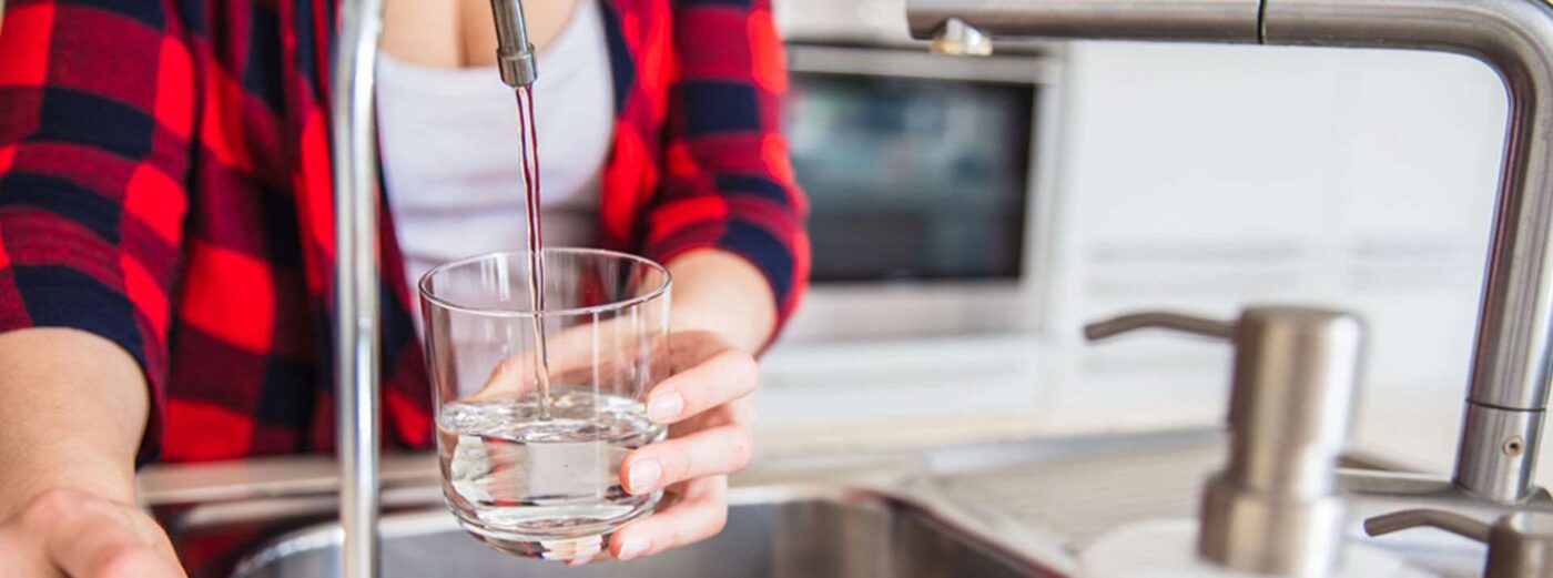 filling glass of water