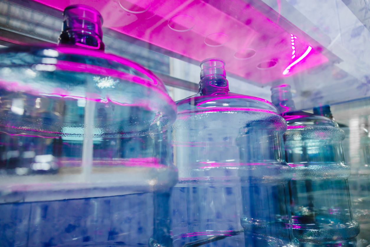 drink water factory using UV light disinfection sterilization system in production line to clean drinking water bottle tank